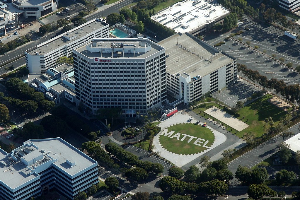 Aerial view of Mattel's corporate headquarters with the company name spelled out in white landscaping on the lawn.