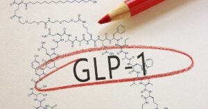 Obesity Reframed: WHO Issues First Global Guidelines for GLP‑1 Therapy GLP-1 written on paper and circled in red pencil, overlaid on a structural chemical diagram.