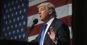 President Trump speaking at a podium