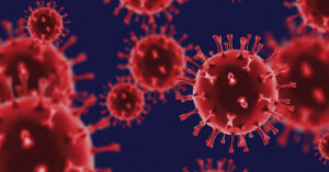 Understanding How COVID-19 and Its Vaccines Can Affect Shingles Risk microscopic illustration of the SARS-CoV-2 virus,