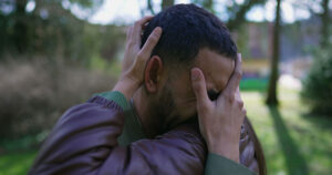 11 Phrases That Could Signal a Lack of Empathy man crying on another person's shoulder