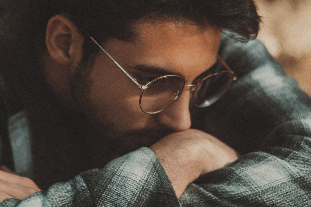 Contemplative Portrait of a Young Man in Autumn Fashion