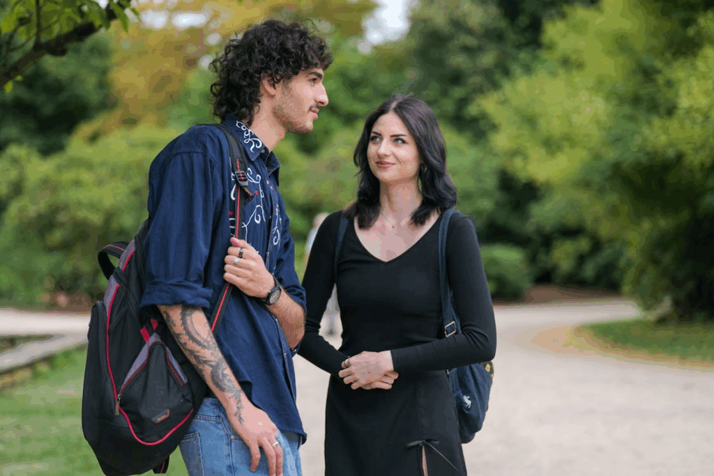 Young Couple Chatting in a Scenic Park