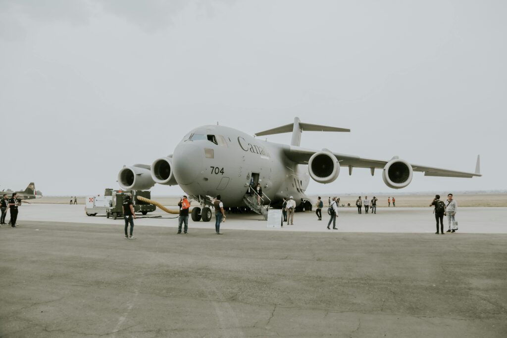 People Around Airplane Standing on Tarmac
