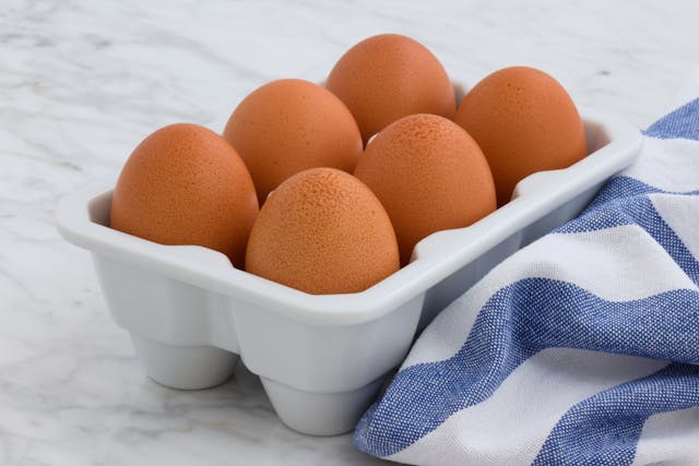 six eggs in a holder