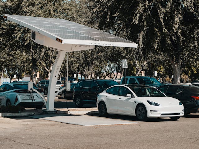 Tesla vehicle next to solar bay