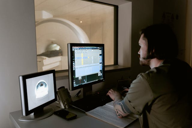 doctor looking at MRI software