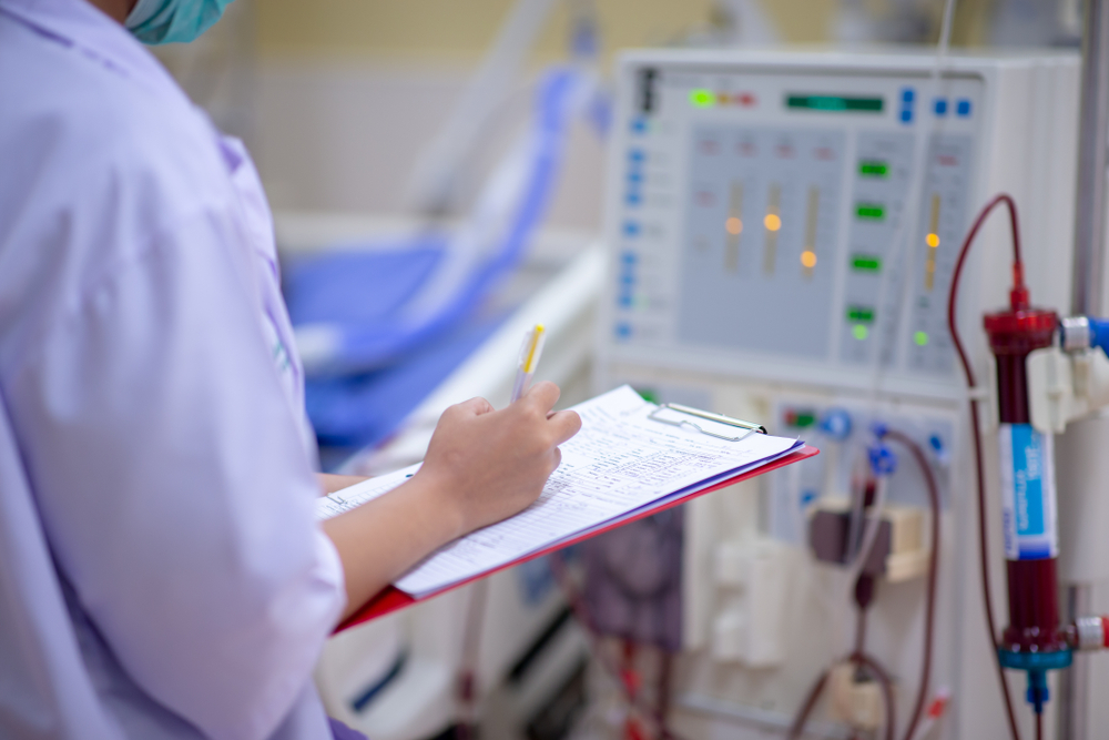 The specialist are checking continuous renal replacement therapy equipment and injection pump and hemodialysis machine.