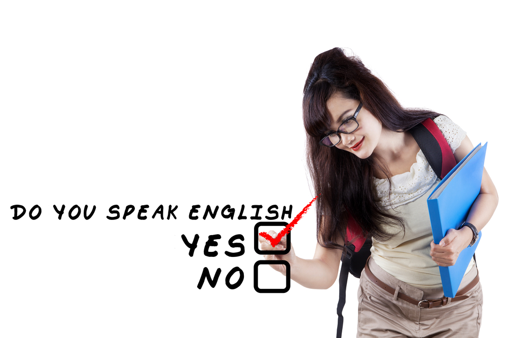 Learning language concept. Female student write Do You Speak English?