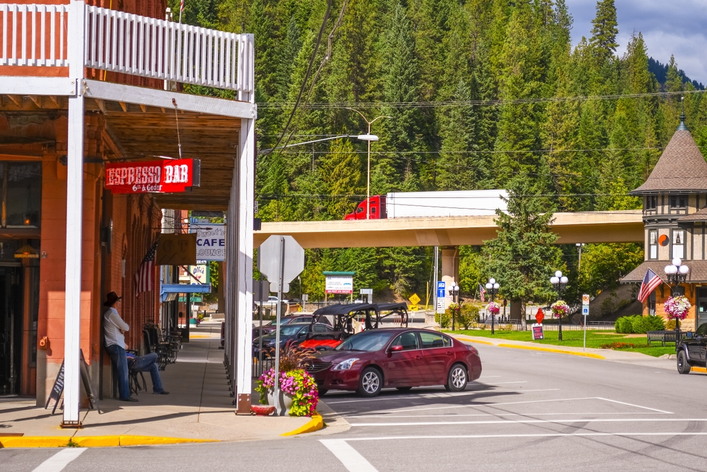 Wallace, Idaho - September 27 2024: Locals relax outside the Wallace Hotel Bar in the historic Silver Valley mining town of Wallace, Idaho, near Coeur d'Alene in the North Idaho panhandle.