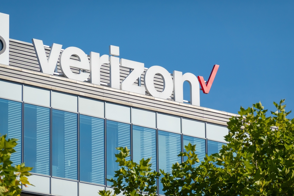 Ostrava, Czechia - September 28, 2023: Banner of Verizon mobile carrier on modern building behind trees