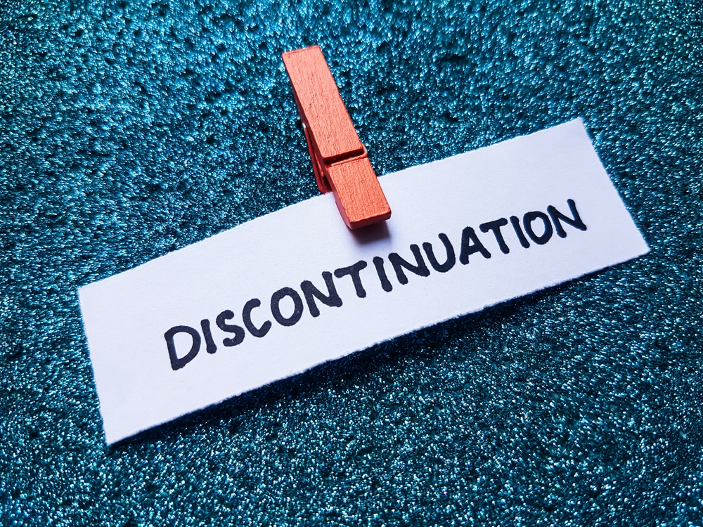 Discontinuation writting on blue background.