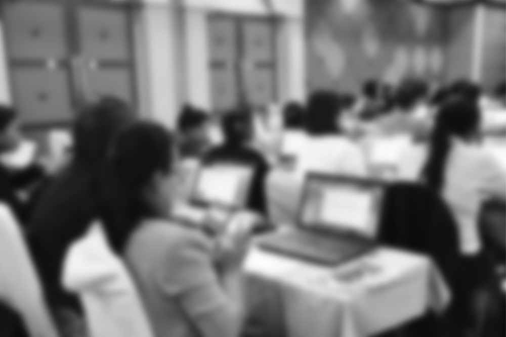 Blurred business people on information technology training