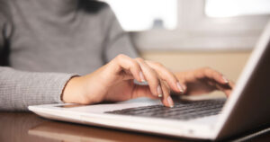 Bernie Sanders Proposes 32-Hour, Four-Day Workweek in the US — Here’s How It Might Work woman working at laptop