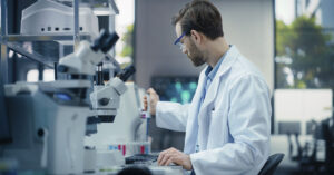 Researchers Reveal a Roadmap for Creating Lab-Grown Kidney Cells with Preclinical Potential scientist working with laboratory equipment, likely in a research or clinical setting
