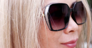 Blond asian woman wearing sun glasses. Portrait. Dalat. Vietnam.