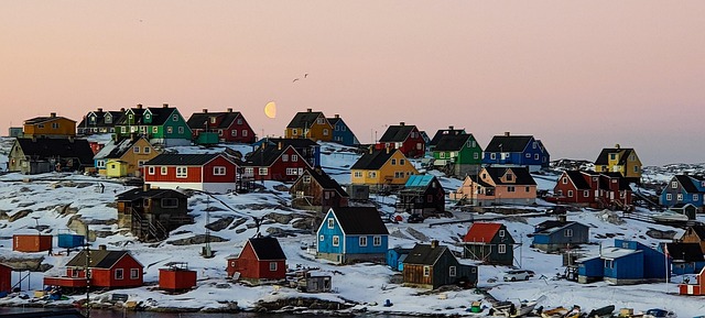 houses on a snowy hill in Greenland