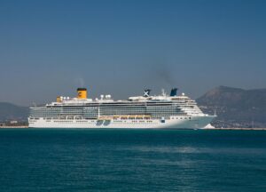10+ Cruise Ships That Aced CDC Health Inspections Luxury Cruise Ship Sailing Near Corfu's Coastline