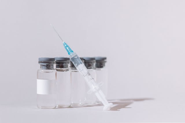 vaccine vials and syringe