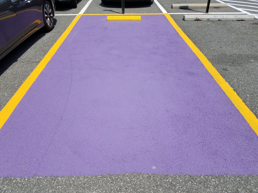 purple and yellow parking space for veterans