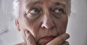 Closeup portrait of old lady face