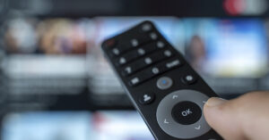 remote pointing at TV screen