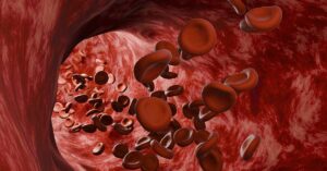 Red blood cells moving through an artery, 3d rendering