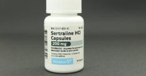 Sertraline Users Advised to Watch for Symptoms of Rare but Serious Reactions White plastic bottle of Sertraline HCL, 200mg capsules