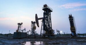 7 Horror Stories Unearthed by Humanity’s Insatiable Need to Dig Deep a pump jack (also known as a walking beam pump) operating in an oil field