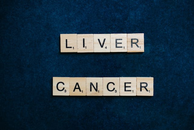 scrabble letters spelling liver cancer