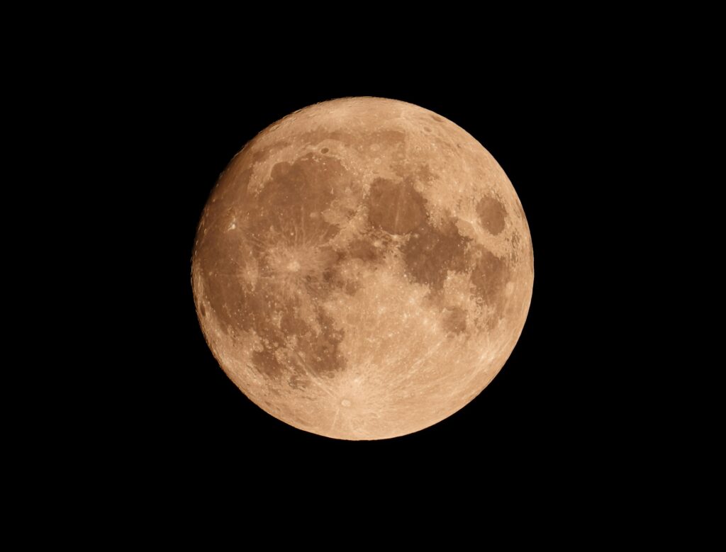 Full Moon in Dark Night Sky
