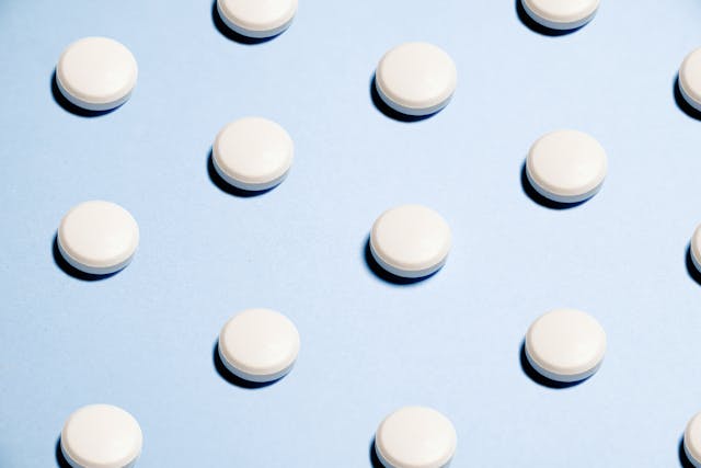pills on a blue background