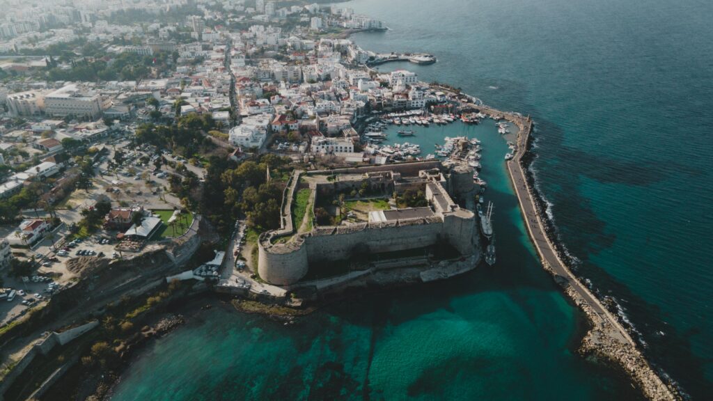 Aerial View of Castle and City on the Coast
