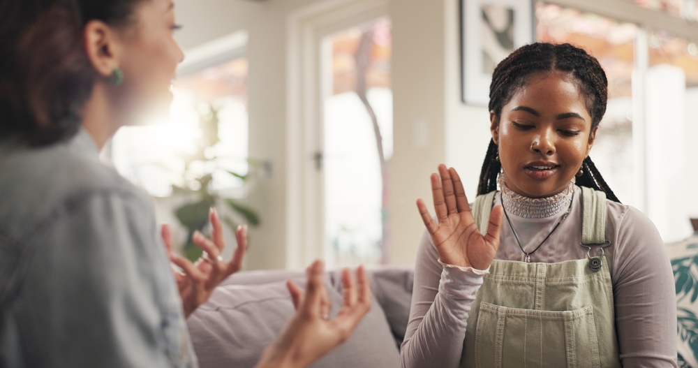 Frustrated women, friends and disagreement with argument for conflict, toxic discussion or ignore at home. Female people, bad friendship or talk with dispute for confession, quarrel or fight on sofa