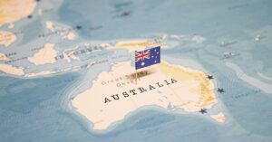 Australia’s New Law Makes This Six-Word Phrase a Crime With Up to 2 Years’ Prison World map, focused on Austrailia with its flag placed in the middle of the country.