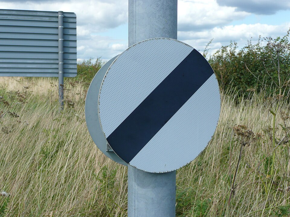 a speed limit sign in the United Kingdom