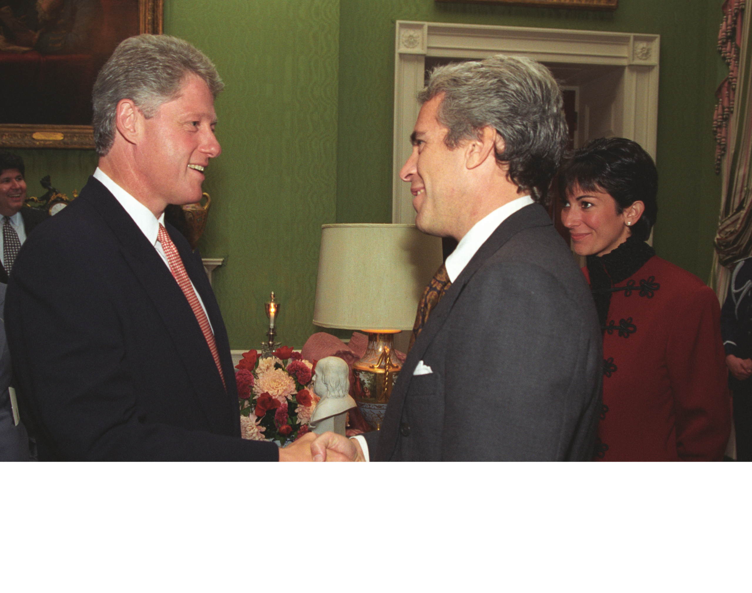 Bill Clinton meeting Jeffrey Epstein and Ghislaine Maxwell in the White House in 1993.