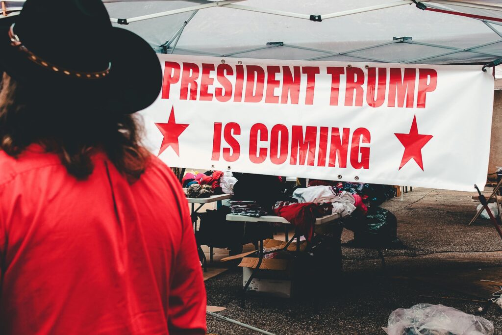 Person Standing Beside Canopy Tent

