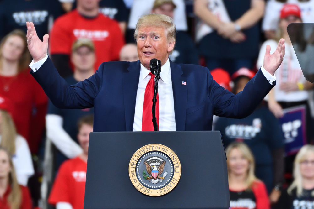 HERSHEY, PA - DECEMBER 10, 2019:President Donald Trump gestures in total disbelief with arms raised during a campaign rally at the Giant Center. 