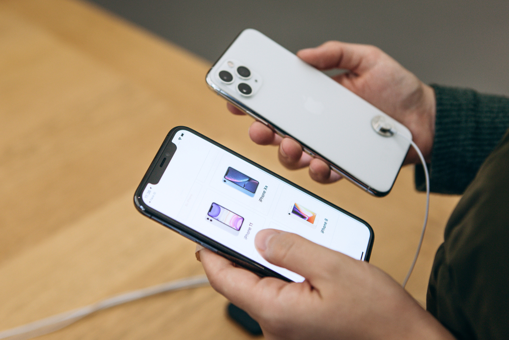Turkey, Istanbul, December 17, 2019: A person holds the new iPhone 11 pro max and selects it for purchase among other models of Apple phones.