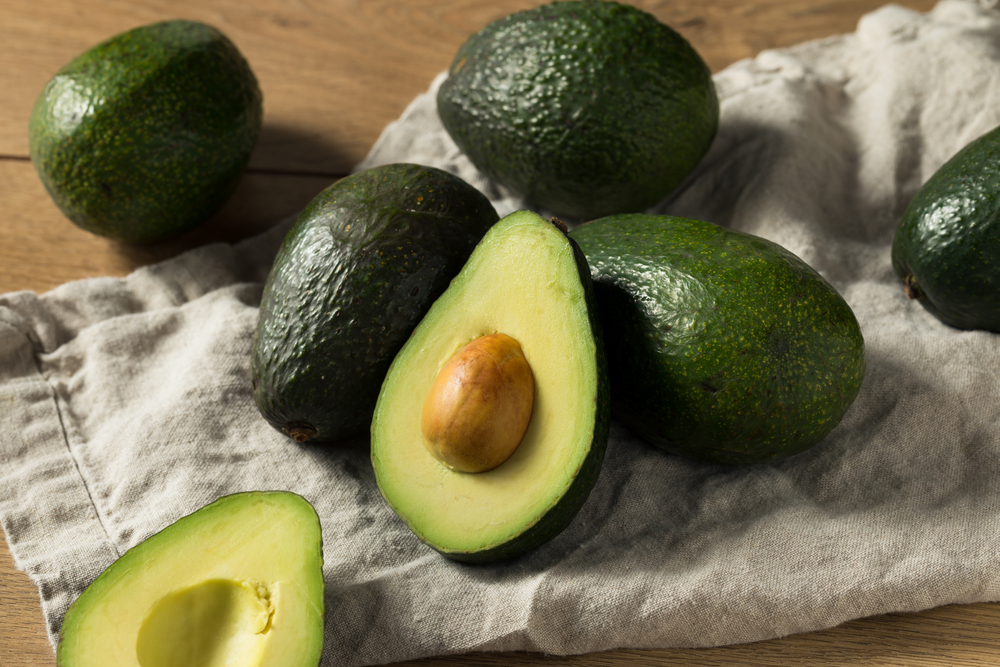 Raw Green Organic Avocados in a Bunch