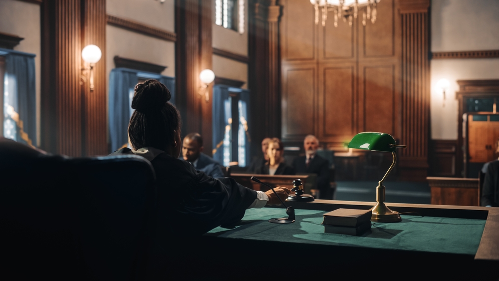 Cinematic Court of Law and Justice Trial: Female Judge Ruling Out a Decision in a Civil Family Case, Striking Gavel to Close Hearing. Convicted Male Defendant is Heartbroken, Lawyer Provides Support.