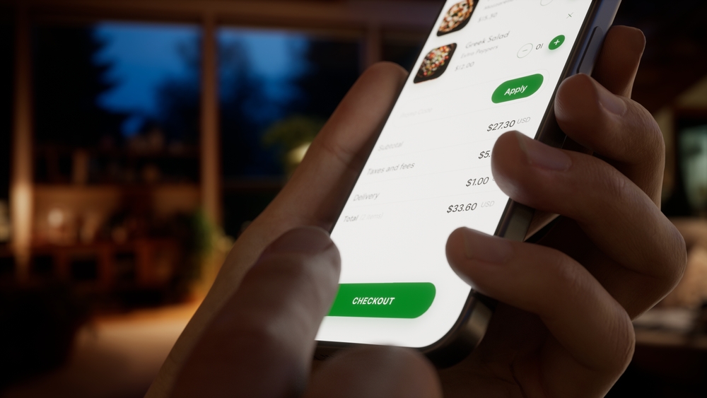 EXTREME CU Caucasian man using fictional food delivery application to make an order