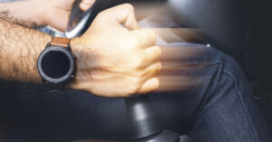 Driver's Surprised to Learn What 'G' Means on a Manual Stick Shift mans hand shifting gears with a manual transmission