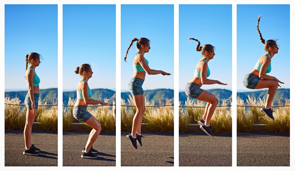 Shifting her fitness into high gear. Composite image of a sporty young woman doing a knee tuck jump outside.