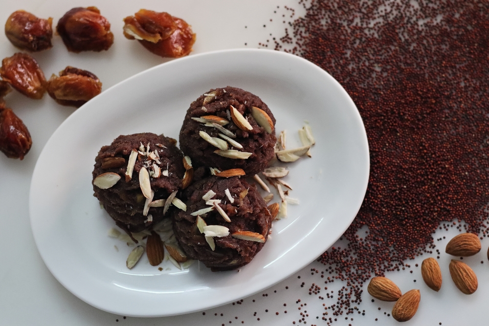Ragi dates Sheera. Indian pudding made of finger millet flour ghee, milk, dates and dry fruits. Traditionally known as ragi halwa. Classic Indian sweet, usually made with semolina, replaced with Ragi
