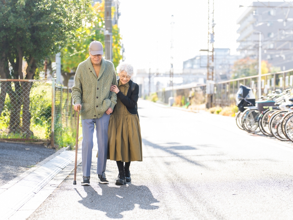Senior couple walking together in the town