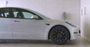 Two Teslas, 500 Miles a Week: Couple Stunned After Real Electricity Bill Revealed White Tesla, profile