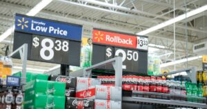 10 Walmart Secrets That Will Change How You Shop (and Save) Walmart pricing signs in store at end of aisle