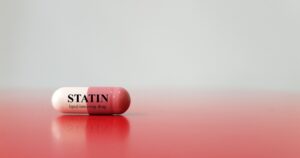 7 Statin Side Effects Doctors Want You to Know About Statin drug pill concept